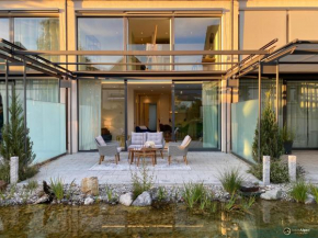 Art House - Luxuriöses Design Ferienhaus mit privatem Atelier und Südterrasse im Inntal - 149 qm Brannenburg